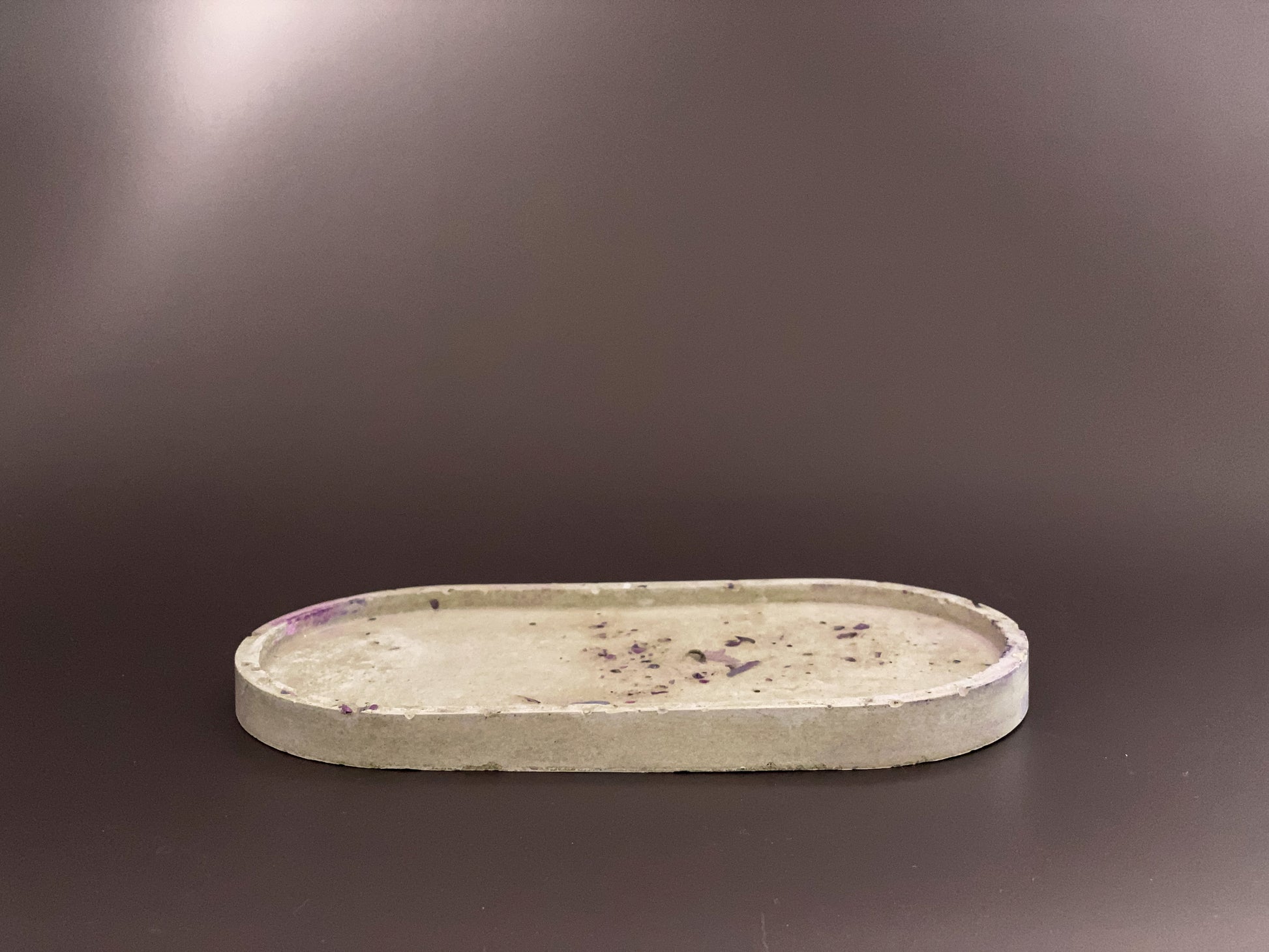 handmade concrete jewellery tray with bold design grey and purple colour for modern interiors