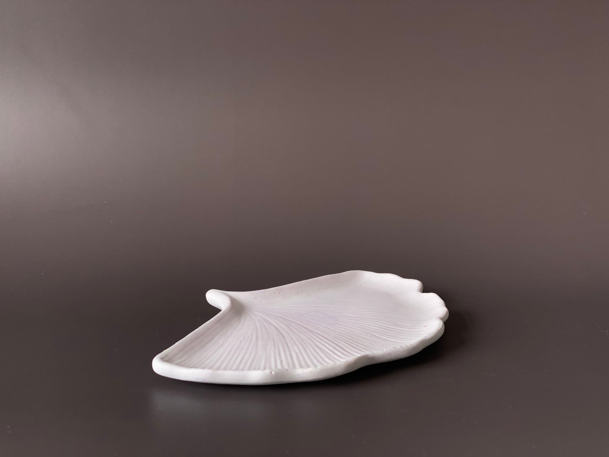 handmade concrete ginkgo leaf jewellery tray with bold design white and lavender colour for modern interiors