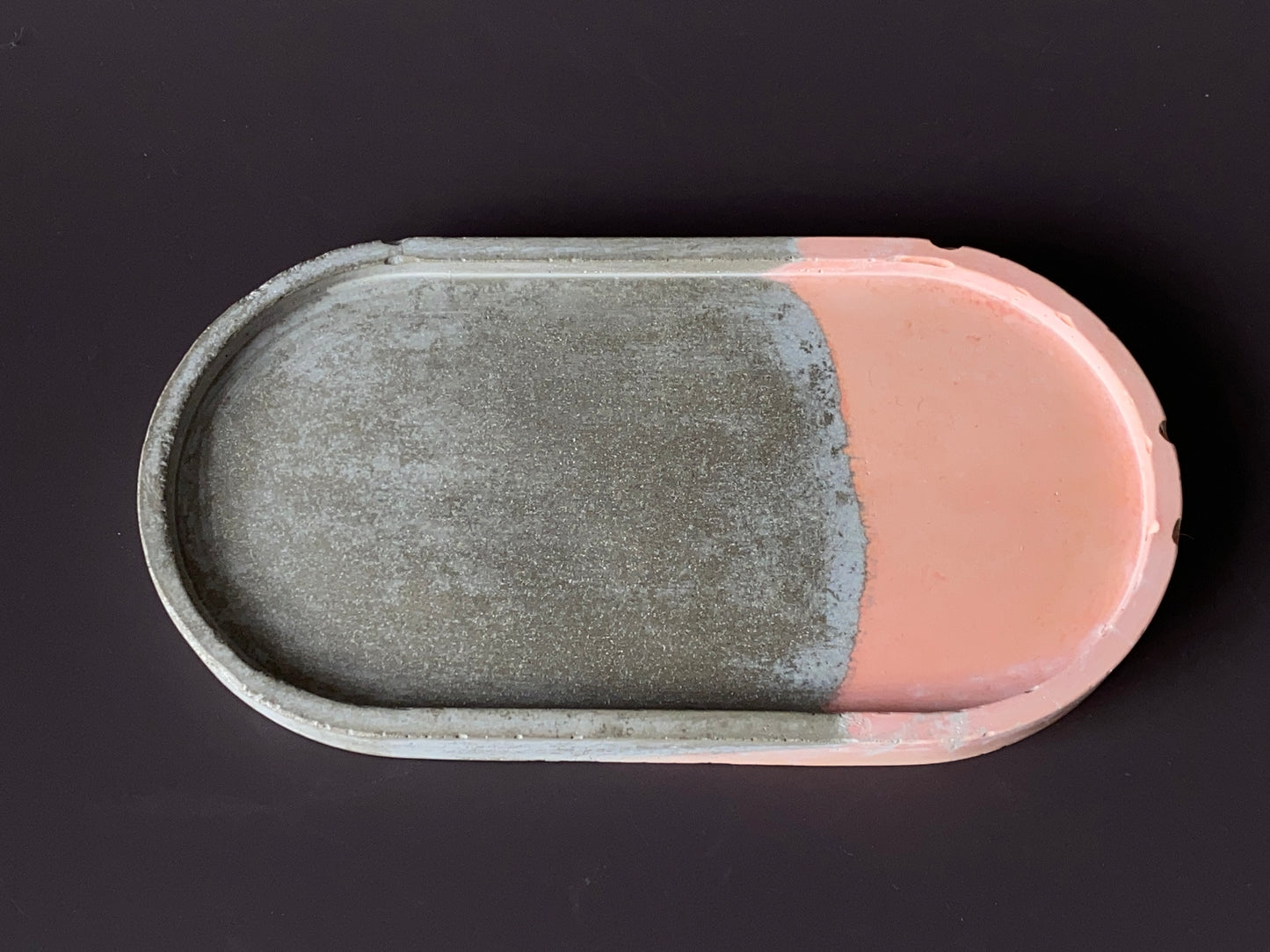 handmade concrete jewellery tray with bold design grey and orange colour for modern interiors