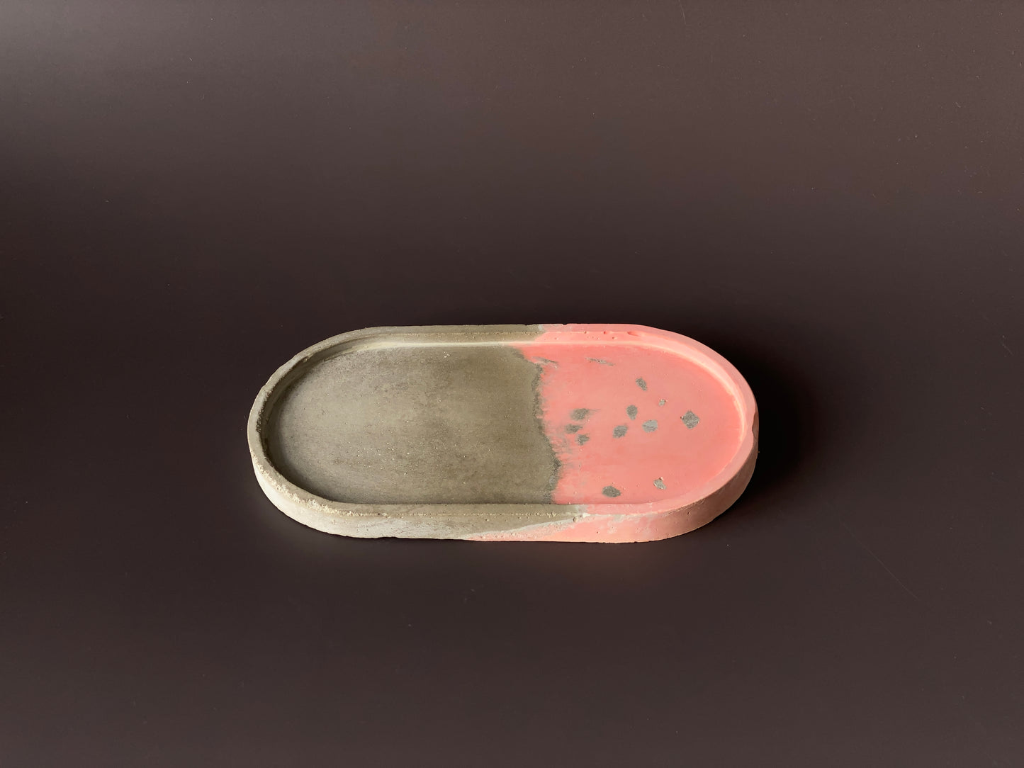 handmade concrete jewellery tray with bold design grey and orange colour for modern interiors