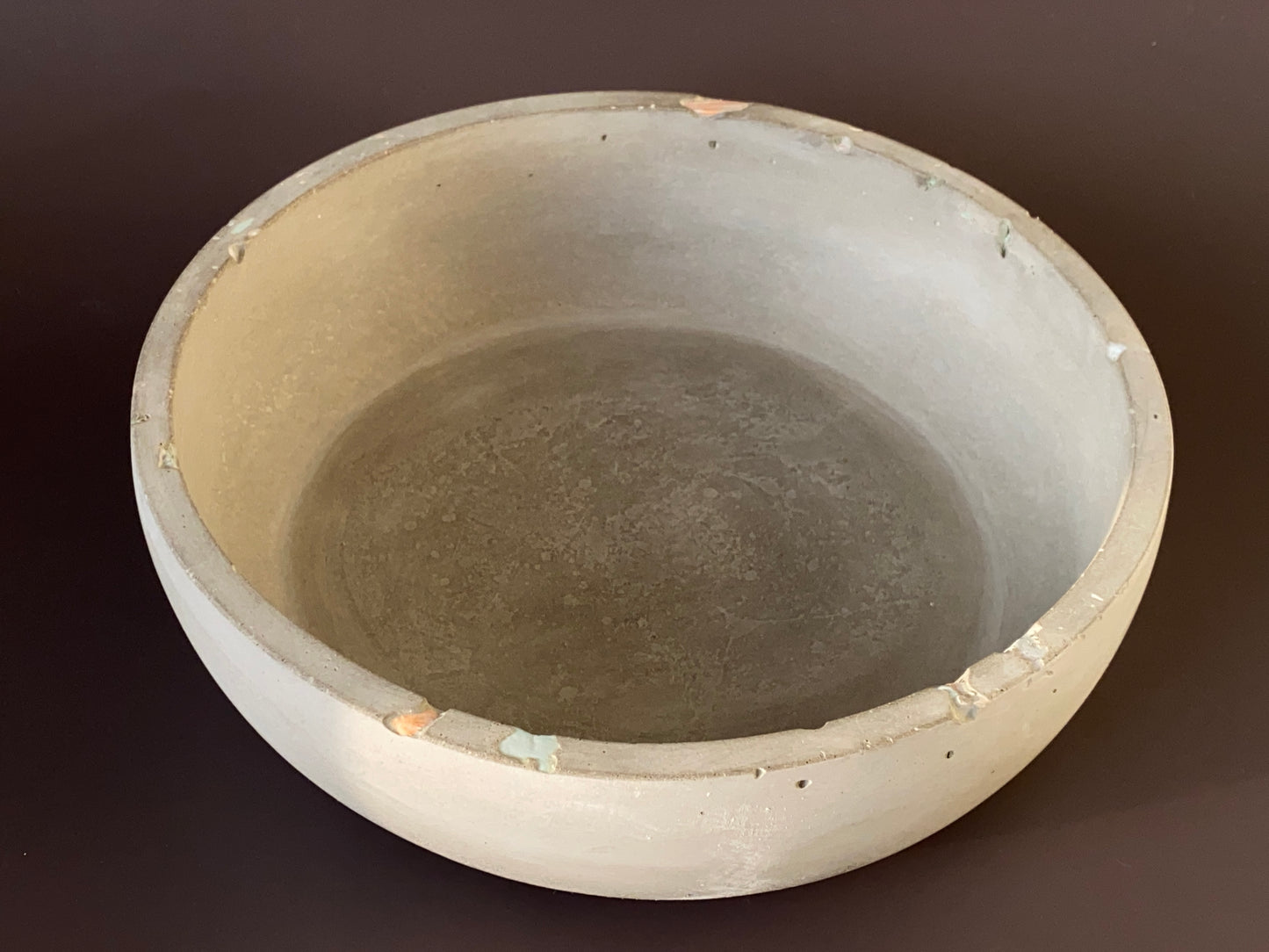 handcrafted cement round bowl with bold industrial grey colour for modern interior